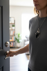 Midnight Sentinel — Wolf & Onyx Sterling Silver Pendant, AR-7461