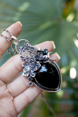 Midnight Sentinel — Wolf & Onyx Sterling Silver Pendant, AR-7461