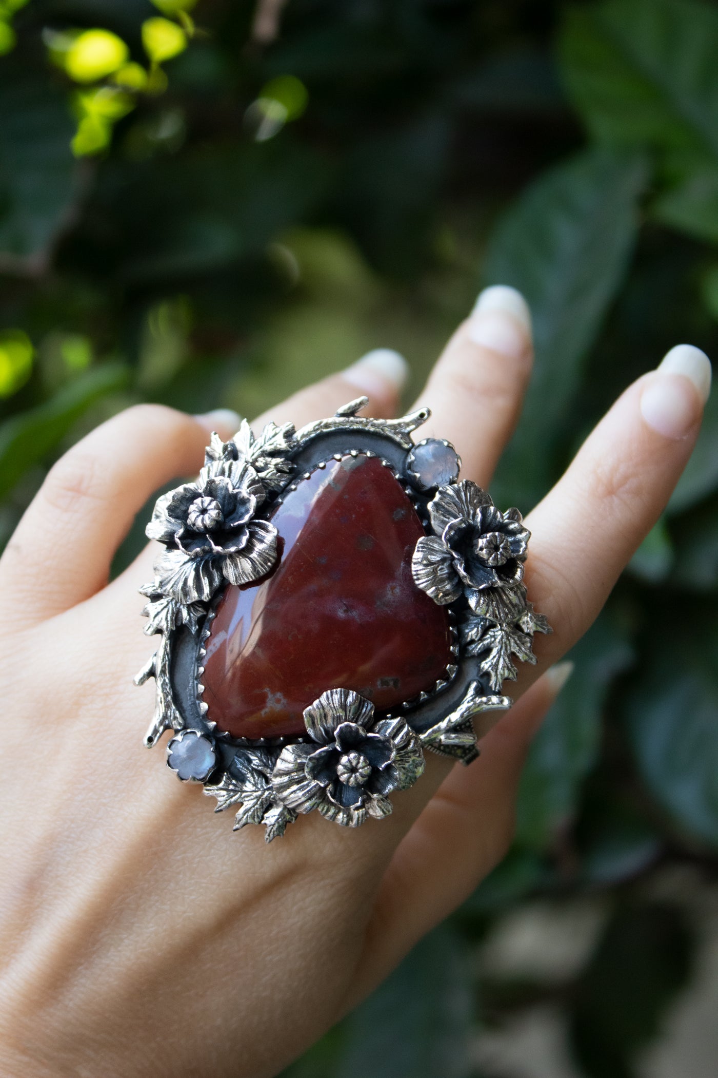 Earthbound Ember — Red Jasper & Moonstone Floral Ring, AR- 7462