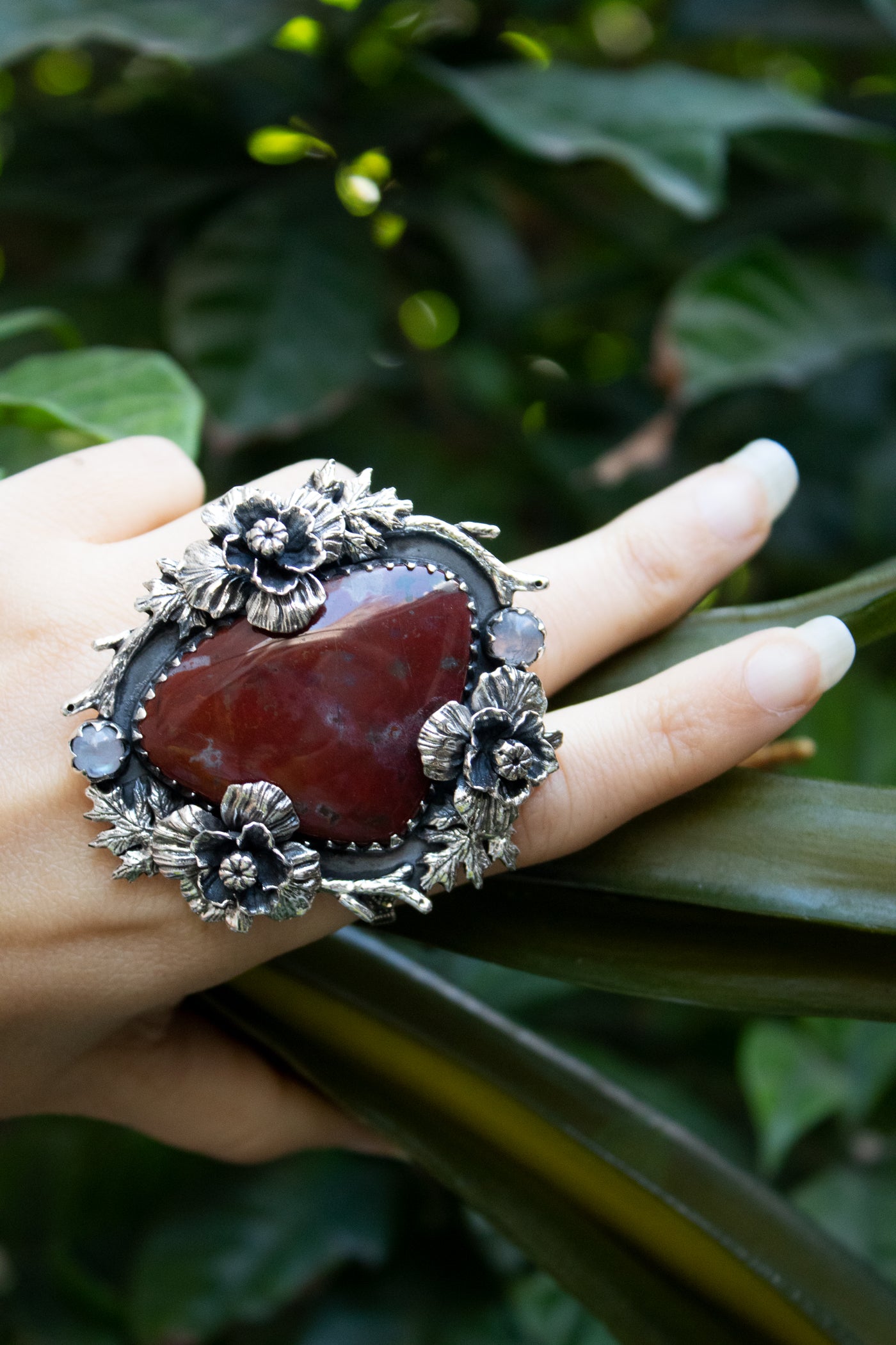 Earthbound Ember — Red Jasper & Moonstone Floral Ring, AR- 7462